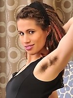 Kitty Bush slips a finger in her furry ass